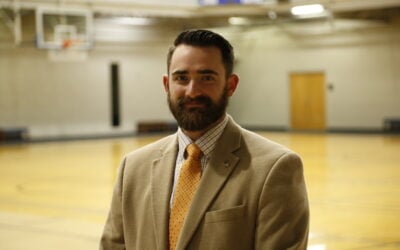 Alumnus keeps busy coaching, teaching, serving on Millbrook City Council