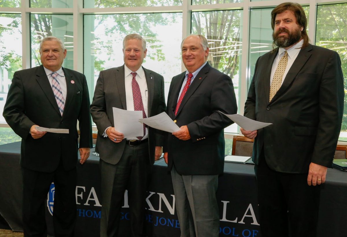 l-r Commissioner Rick Pate, Faulkner President Mike Williams, Federation President Jimmy Parnell, and NALC Director Harrison Pittman pose after signing a memorandum of understanding to establish a three-year Alabama Ag Law Pathway. 